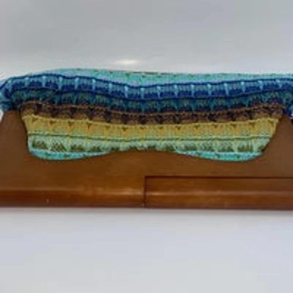 Urban Expressions vibrantly colored clutch bag